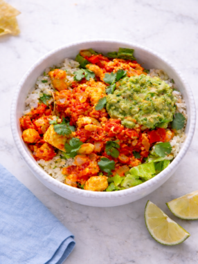 Chipotle-style sofritas made with crumbled tofu in smoky tomato sauce served in a bowl