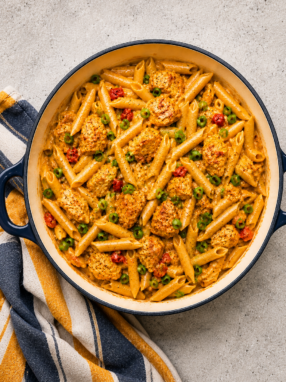 Creamy one pot cajun chicken pasta served in a skillet with tender chicken and penne pasta coated in a rich Cajun sauce